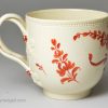 Creamware coffee cup and saucer decorated with enamels over the glaze, circa 1780
