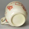 Creamware coffee cup and saucer decorated with enamels over the glaze, circa 1780