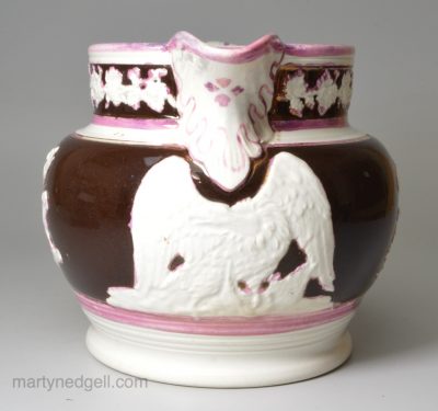 Pearlware pottery jug decorated with pink and copper lustre, circa 1820