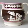 Pearlware pottery jug decorated with pink and copper lustre, circa 1820