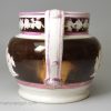 Pearlware pottery jug decorated with pink and copper lustre, circa 1820