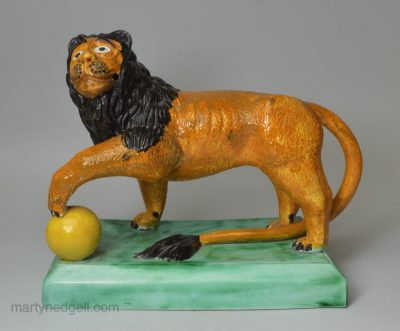 Staffordshire prattware pottery lion, circa 1800