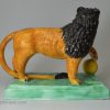 Staffordshire prattware pottery lion, circa 1800