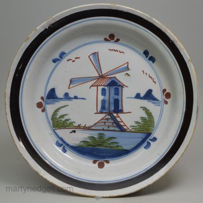 London Delft polychrome windmill pancake plate, circa 1750