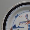 London Delft polychrome windmill pancake plate, circa 1750