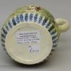 Pearlware pottery jug moulded with the Vicar, Sexton and Clerk decorated with colours under the glaze, circa 1800