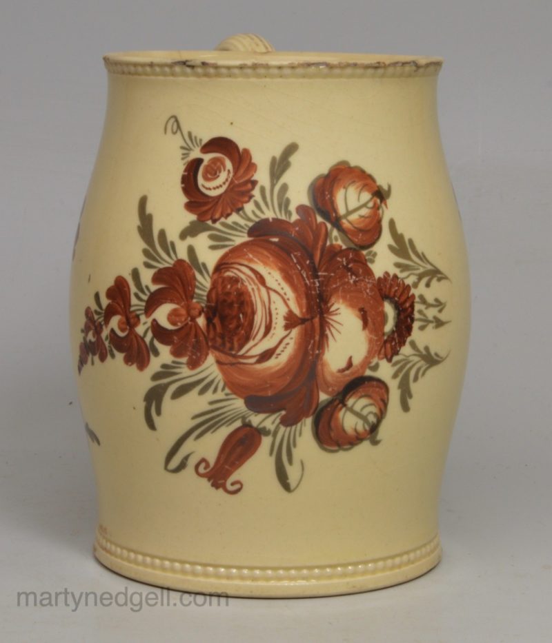 Creamware pottery mug painted in overglaze enamels, circa 1770