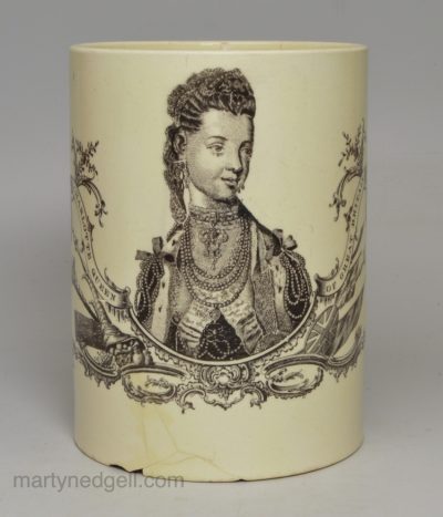 Commemorative creamware mug decorated with a print of Queen Charlotte, circa 1780