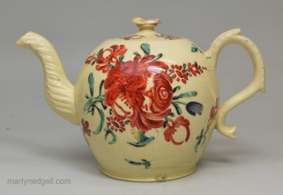 Creamware pottery teapot decorated with enamels over the glaze, circa 1770, possibly Cockpit Hill