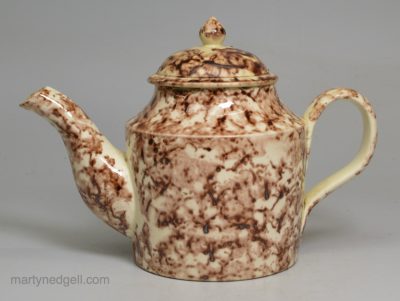 Small creamware pottery teapot decorated with Whieldon type colours under the glaze, circa 1780