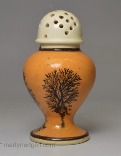 Mochaware pepper pot decorated with a dendritic design, circa 1820