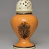 Mochaware pepper pot decorated with a dendritic design, circa 1820