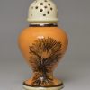 Mochaware pepper pot decorated with a dendritic design, circa 1820