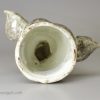Pair of pearlware pottery greyhound head stirrup cups decorated with Whieldon type colours under the glaze, circa 1800