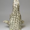 Pair of pearlware pottery greyhound head stirrup cups decorated with Whieldon type colours under the glaze, circa 1800