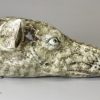 Pair of pearlware pottery greyhound head stirrup cups decorated with Whieldon type colours under the glaze, circa 1800