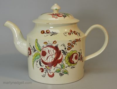 Creamware pottery teapot painted with overglaze enamels, circa 1780