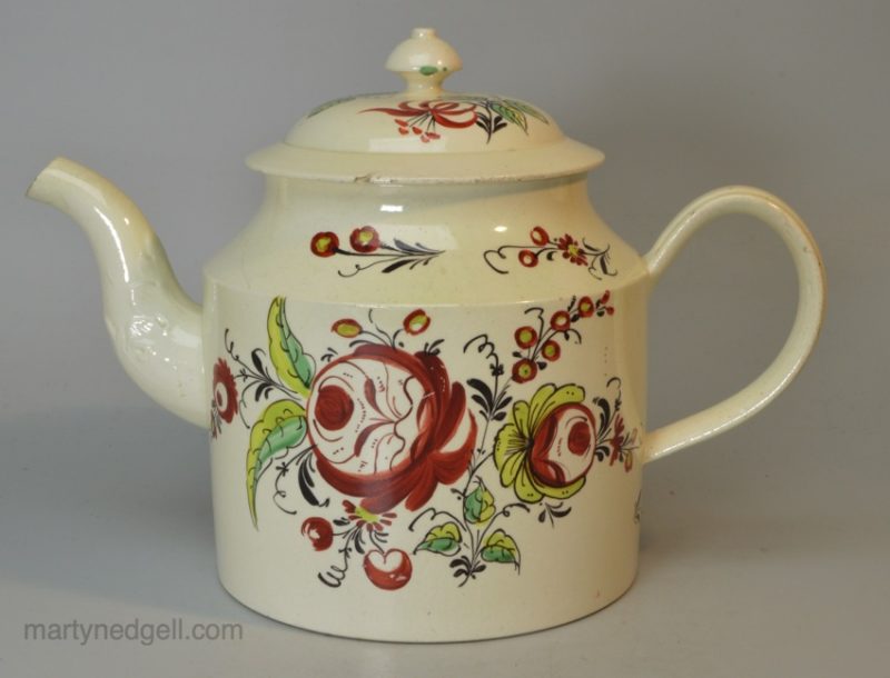 Creamware pottery teapot painted with overglaze enamels, circa 1780
