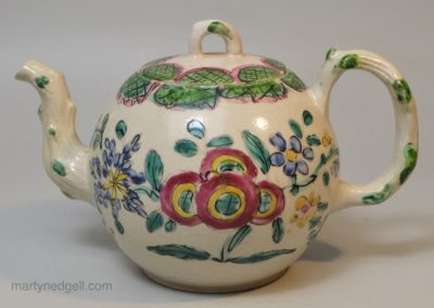 Staffordshire white salt glaze teapot decorated with enamels, circa 1760