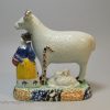 Pair of Yorkshire type prattware sheep with attendants, circa 1820