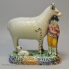 Pair of Yorkshire type prattware sheep with attendants, circa 1820
