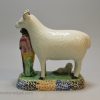 Pair of Yorkshire type prattware sheep with attendants, circa 1820