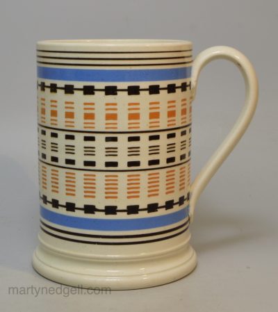 Mochaware mug decorated with inlaid slip, circa 1830