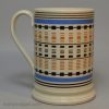 Mochaware mug decorated with inlaid slip, circa 1830