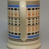 Mochaware mug decorated with inlaid slip, circa 1830