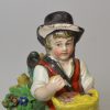Staffordshire pearlware pottery figure of a boy with wings, circa 1820
