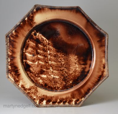 Creamware pottery plate decorated with Whieldon type colours under the glaze, circa 1770
