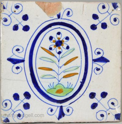 Dutch Delft floral tile, circa 1680