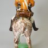 Staffordshire pottery figure of a Hussar on horseback decorated with enamels under the glaze, circa 1760
