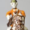 Staffordshire pottery figure of a Hussar on horseback decorated with enamels under the glaze, circa 1760