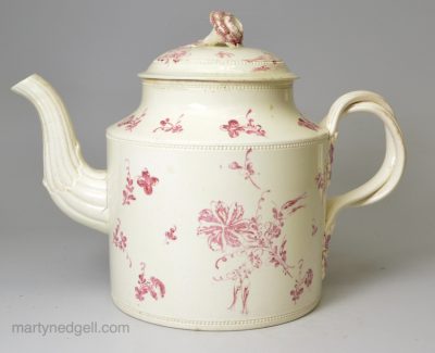 Creamware pottery teapot decorated with puce enamels, circa 1770