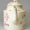 Creamware pottery teapot decorated with puce enamels, circa 1770
