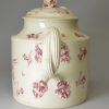 Creamware pottery teapot decorated with puce enamels, circa 1770