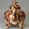 Creamware pottery teapot decorated with Whieldon type colours under the glaze, circa 1770