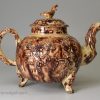 Creamware pottery teapot decorated with Whieldon type colours under the glaze, circa 1770