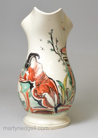 English creamware pottery cream jug decorated in the Netherlands, circa 1780