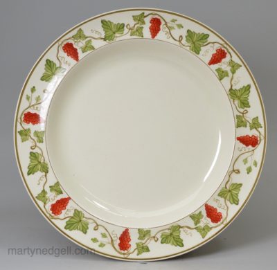 Wedgwood creamware pottery plate with painted grapevine border made for James Powell & Sons, circa 1900