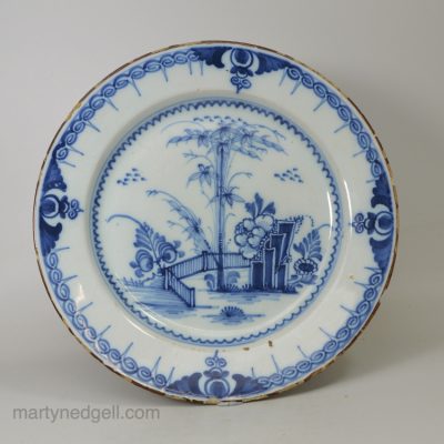 London delft plate decorated in blue, circa 1750