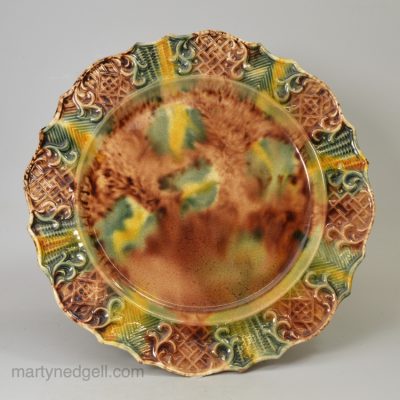 Creamware plate decorated with Whieldon type colours under the glaze, circa 1770