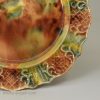 Creamware plate decorated with Whieldon type colours under the glaze, circa 1770