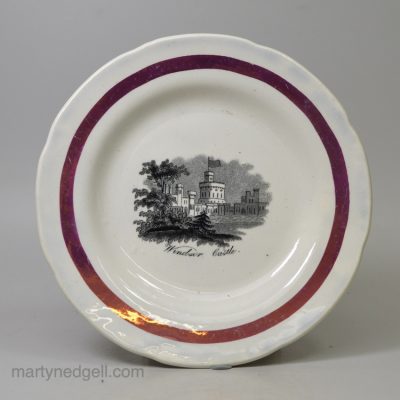 Small pearlware pottery plate decorated with a print of Windsor Castle and a pink lustre border, circa 1840