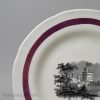 Small pearlware pottery plate decorated with a print of Windsor Castle and a pink lustre border, circa 1840