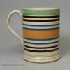 Mochaware pearlware mug decorated with bands of slip, circa 1820