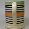 Mochaware pearlware mug decorated with bands of slip, circa 1820