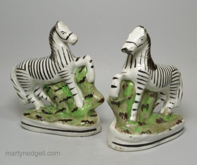 Pair of Victorian Staffordshire zebras, circa 1880