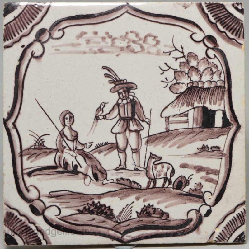 Liverpool delft biblical tile painted in manganese with a man with hawk, circa 1750